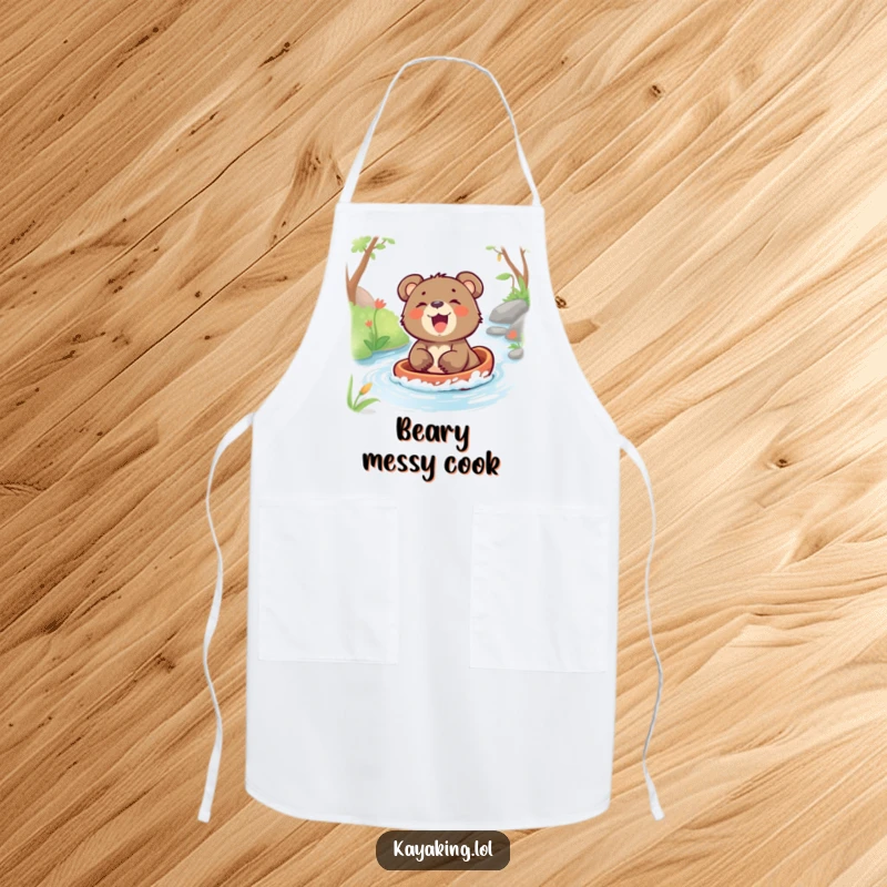 Funny apron with a laughing bear cub gleefully riding down a stream, ready for kitchen adventures with a smile.