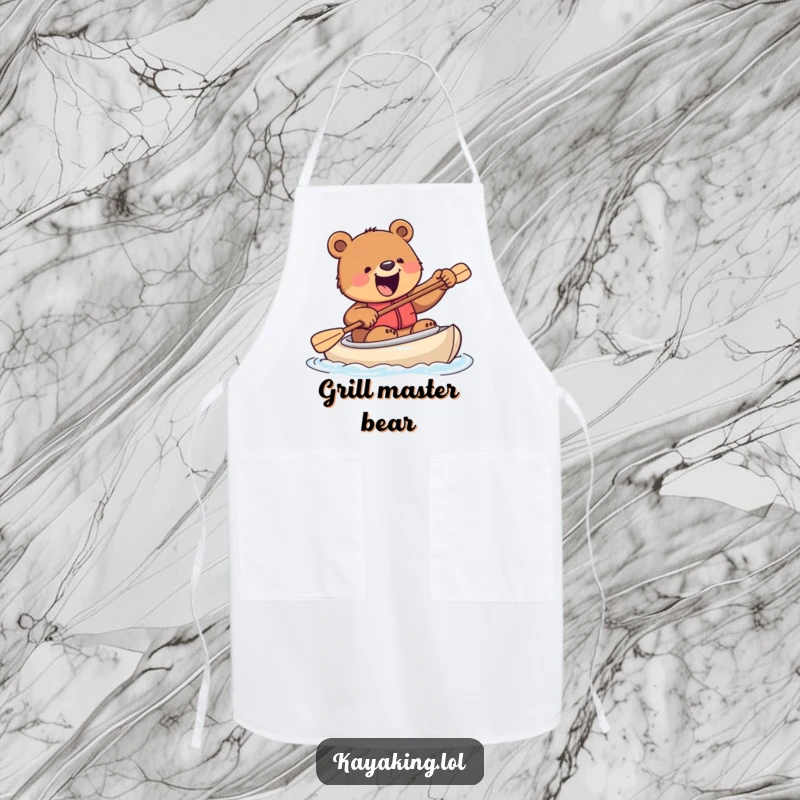 Funny apron showing an excited bear attempting to steer a kayak with a paddle, bringing a sense of wild adventure to the kitchen.