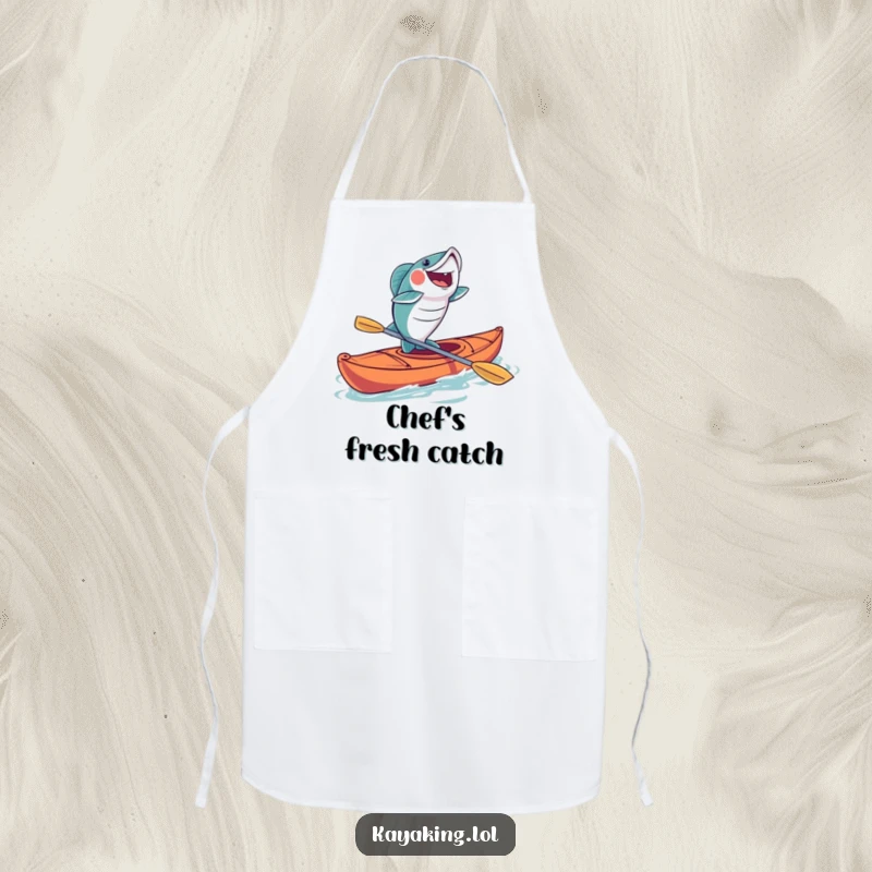 Funny fish kayaking apron showing a fish leaping joyfully from a kayak, a humorous kitchen accessory for passionate anglers.