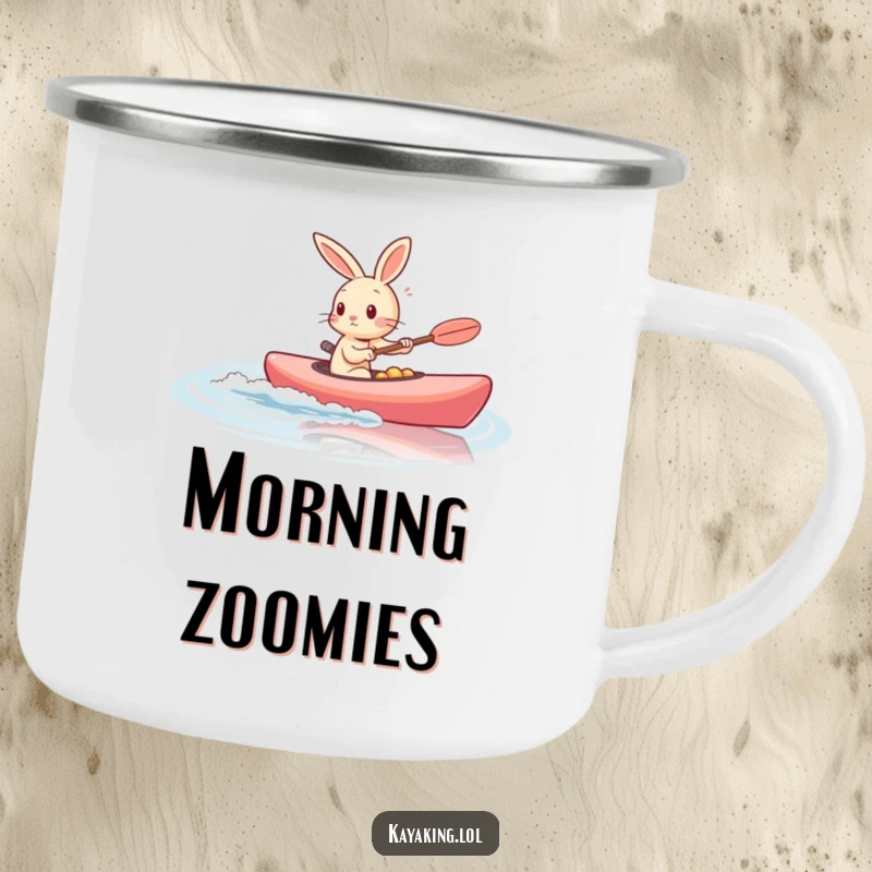 Funny rabbit kayaking fast on calm water, enhancing a sturdy camping mug for outdoor enthusiasts.