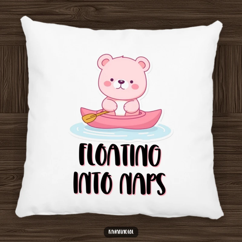 Funny pink bear pillow featuring a bear serenely kayaking, offering comfort and a touch of peaceful, humorous charm.
