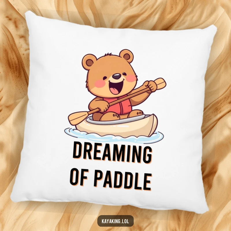 Funny pillow with an excited bear attempting to steer a kayak with a paddle, perfect for adding comfort and a touch of wild humor.