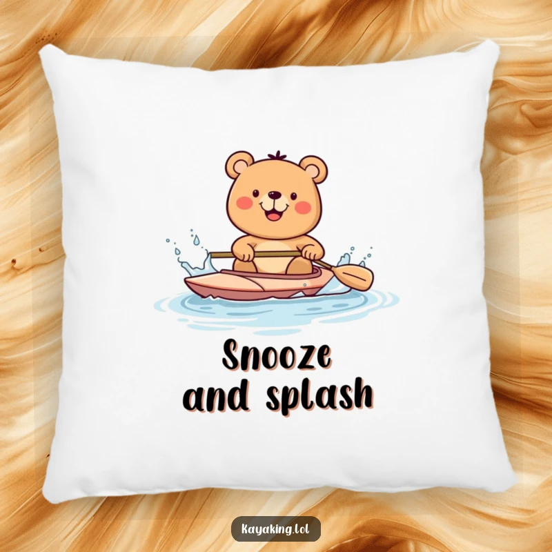 Funny happy bear in a kayak, splashing water with a paddle, featured on a comfortable pillow, perfect for a playful decor.