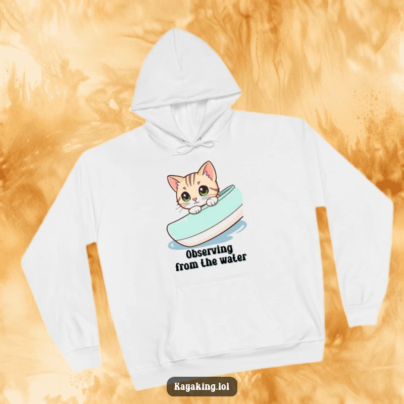 Funny cat peeking from the edge of a kayak, captured on a comfortable hoodie for cozy, adventurous vibes.