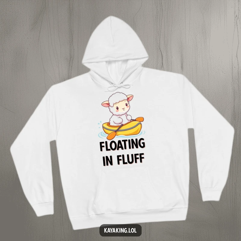 Funny fluffy sheep bobbing in a brightly colored kayak, offering comfort and a touch of whimsy. This hoodie is sheep-er soft.