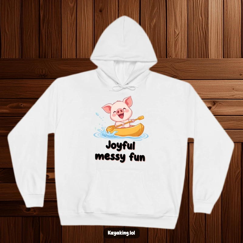 Funny giggling piglet splashing water from a kayak on a hoodie, a cozy and fun design for splash enthusiasts.