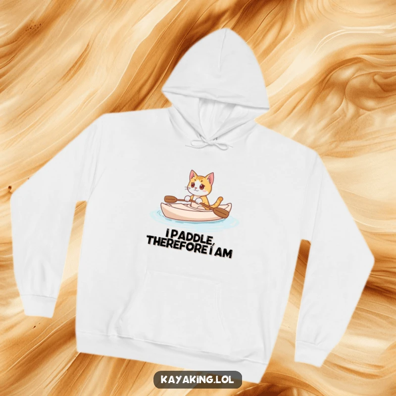 Funny Cat Hoodie: Curious cat serenely kayaking through calm waters, exuding peace and adventure on a cozy garment.