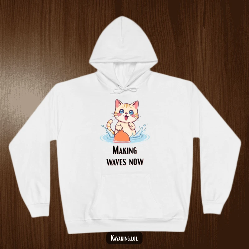Funny Cat Hoodie: A surprised cat character splashes water with a paddle, bringing playful energy to cozy wear.