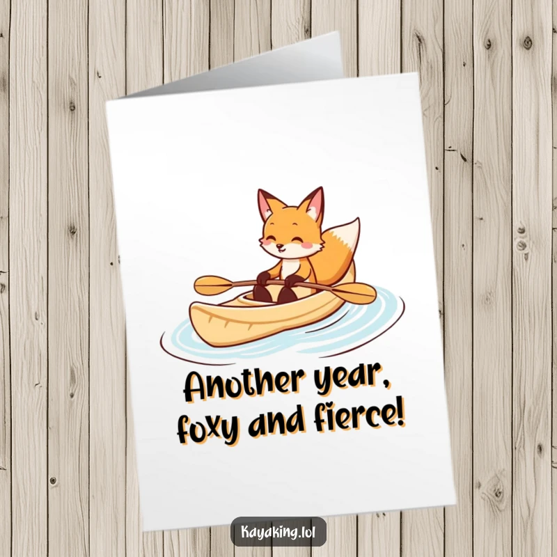 Funny Free Printable Birthday Card: A slyly smiling fox elegantly kayaks through calm blue waves, ready to celebrate.