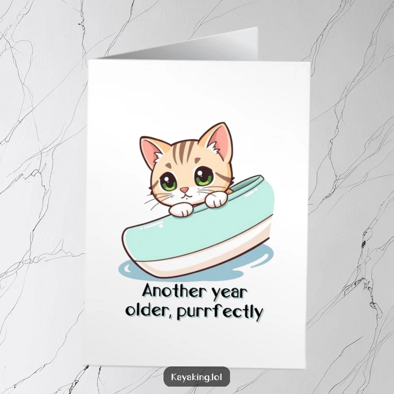 Funny Free Printable Birthday Card: Mischievous cat peeking over kayak edge, curious expression. Printable humor.