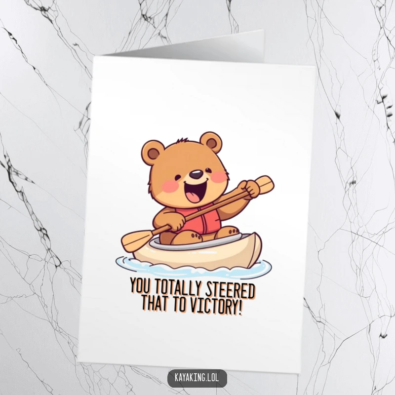 Funny Free Printable Congratulations Card: An excited bear attempts to steer a kayak with a paddle, celebrating their win.