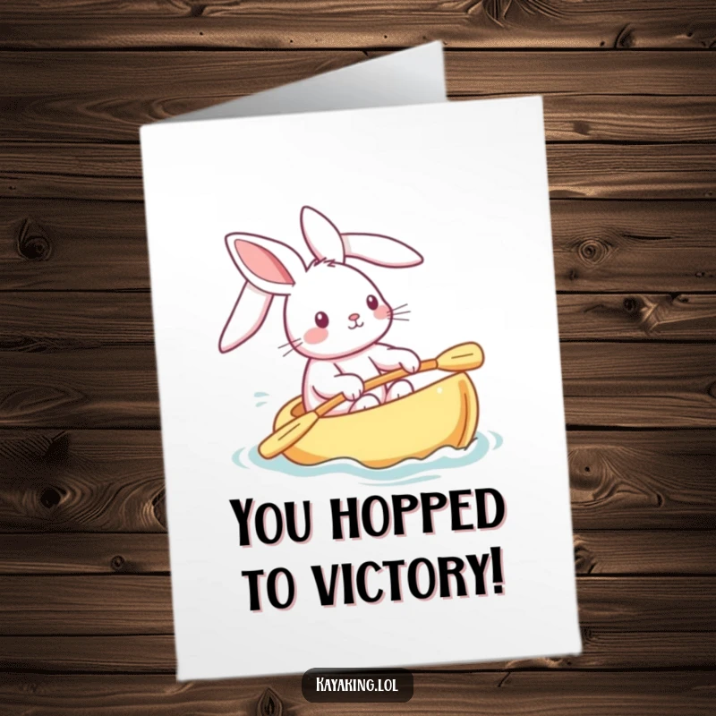 Funny Free Printable Congratulations Card: A playful bunny steering a kayak, floppy ears flying, looking happy.