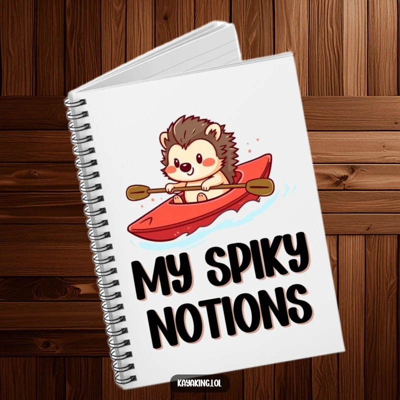 Funny notebook with a smiling hedgehog steering a bright red kayak, perfect for journaling and creative writing.