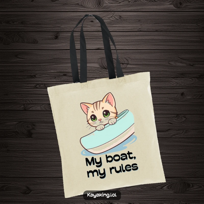 Funny, curious cat peering over the side of a kayak, showcased on a durable tote bag for stylish carrying.