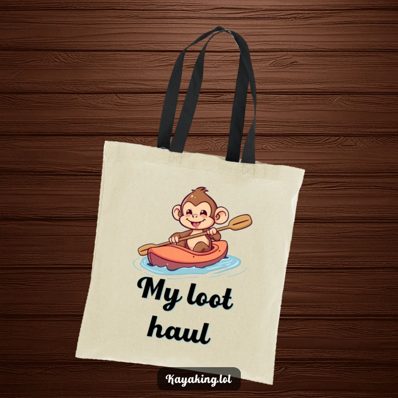 Funny Monkey Tote Bag: A playful monkey with a mischievous grin steering a kayak, perfect for carrying adventure essentials.