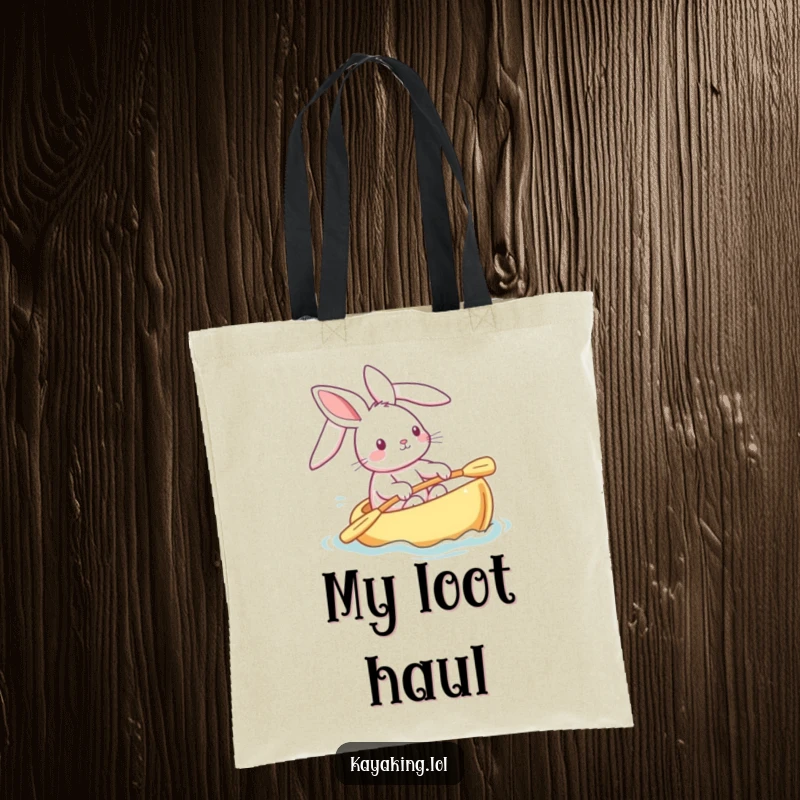 Funny bunny tote bag with a playful rabbit steering a kayak, ears streaming in the wind, a cute and practical accessory.